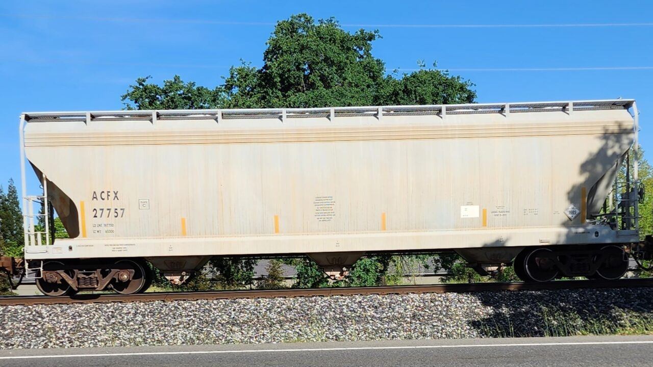 A 3 BAY COVERED HOPPER FOR CARRYING CEMENT