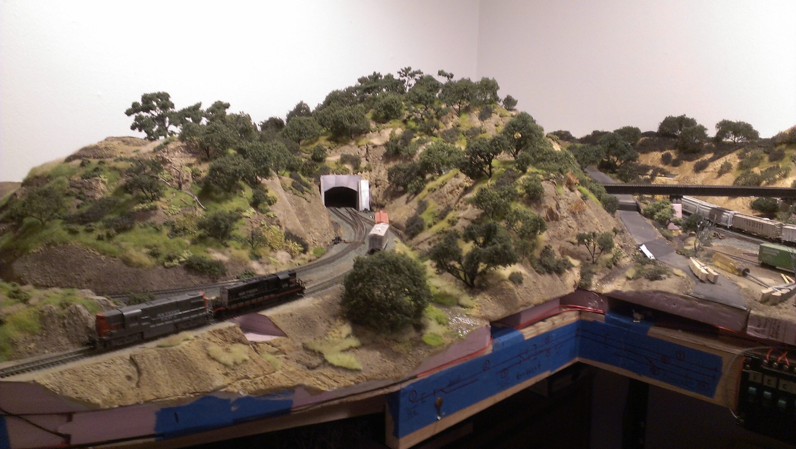 A Model Railroad mountain and tunnel scene created by stacking XPS foam layers.