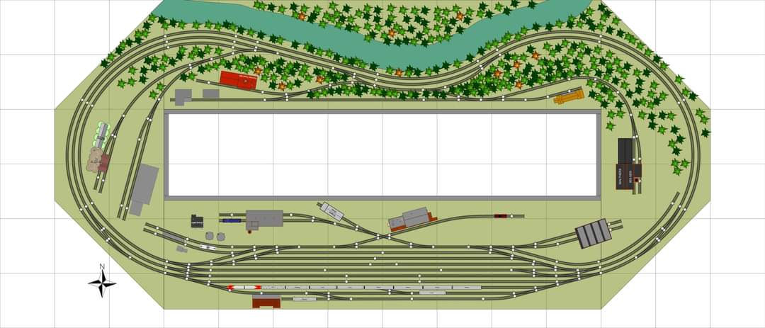 THIS EXCELLENT DONUT STYLE TRACK PLAN HAS A DOUBLE TRACK MAINLINE WITH AN AMPLE YARD, SOME INDUSTRIES AND A SWEEPING RIVER ALONG THE FRONT SIDE.