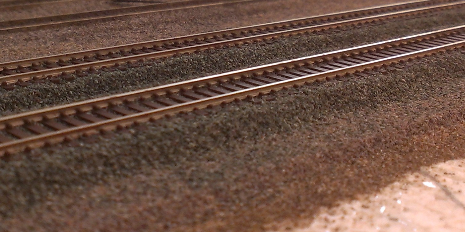 The ballast profile and the sub ballast profile are visible in this photo on my N Scale model railroad featuring realistic track and ballast.