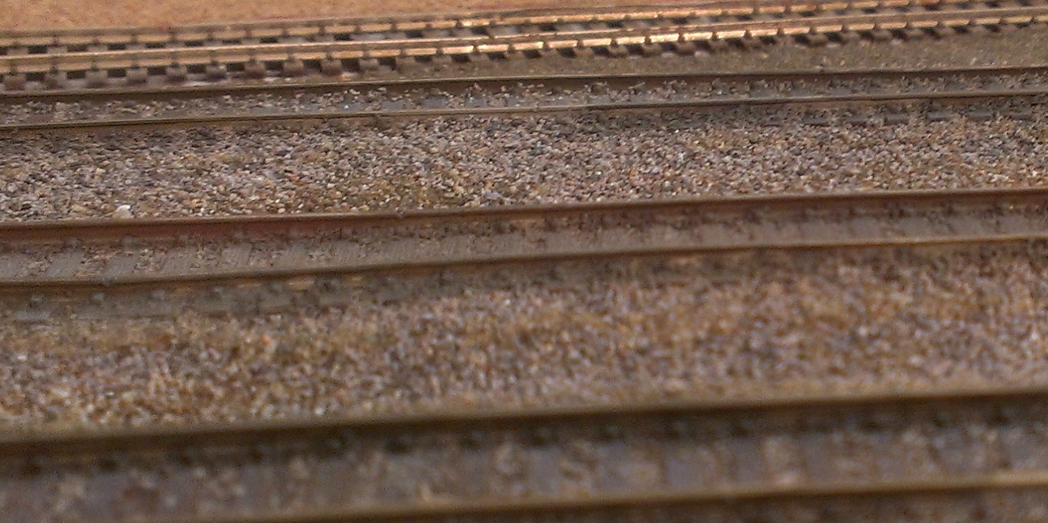 Model railroad yard track ballast variations