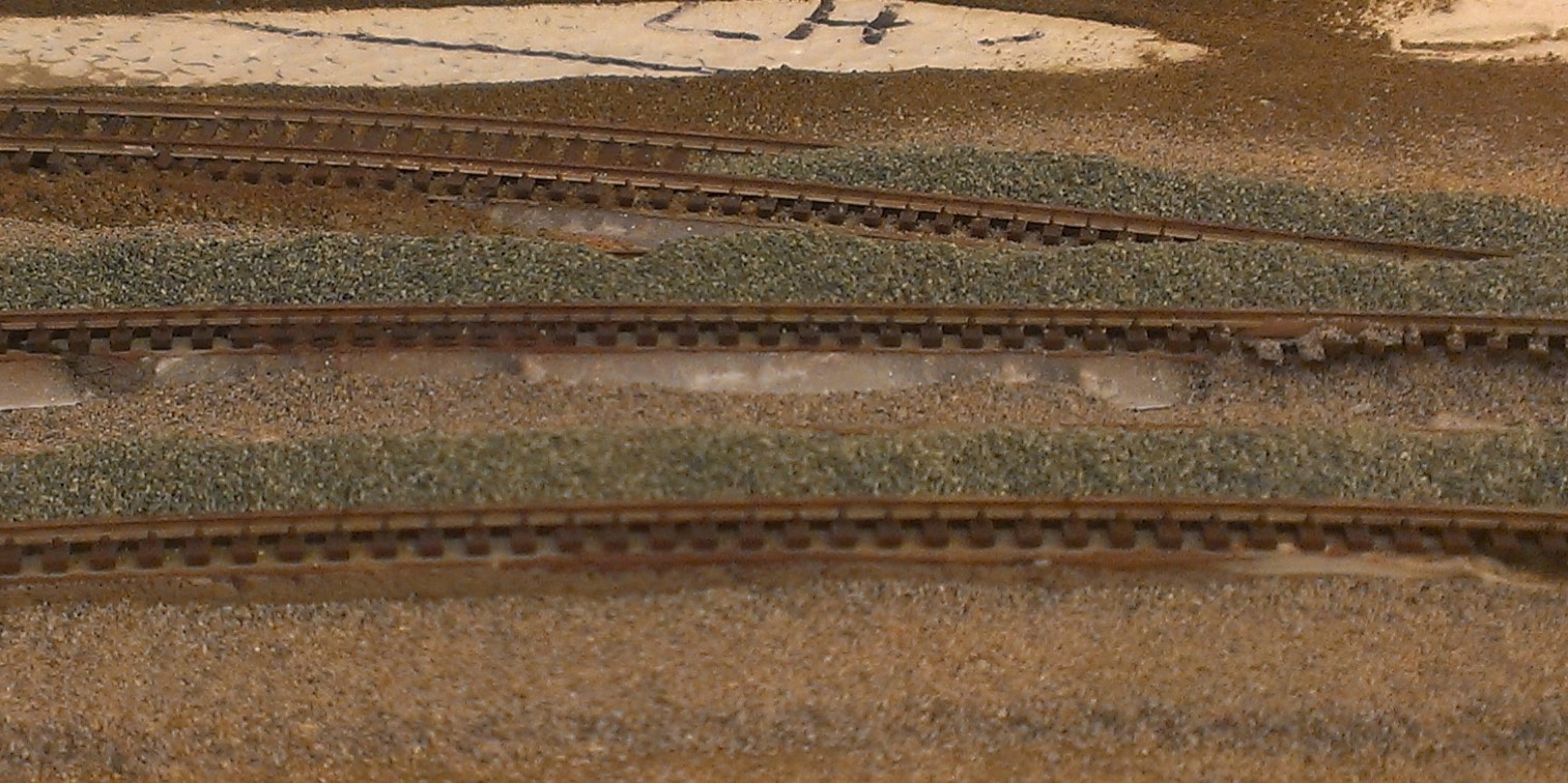 applying ballast to mainline tracks