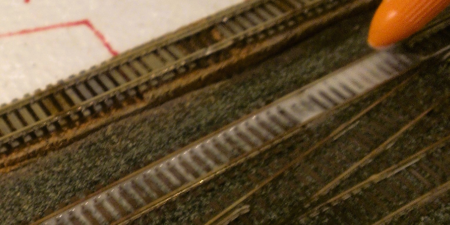 applying glue mixture between tracks